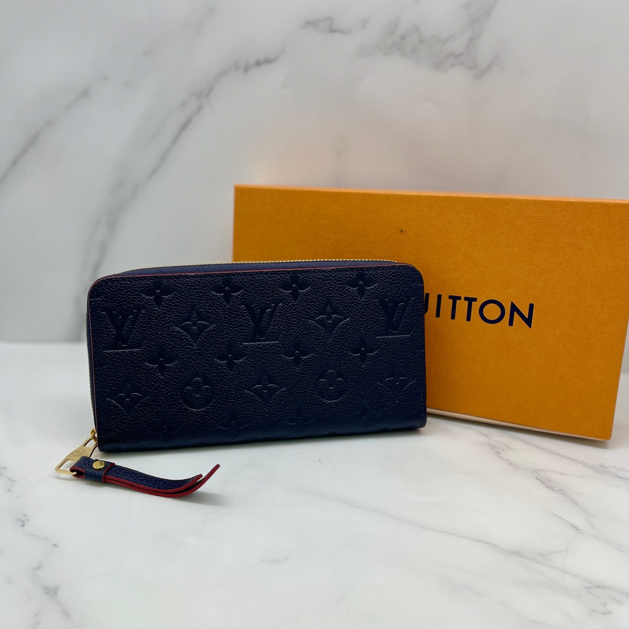 LV Monogram Empreinte Zippy Wallet