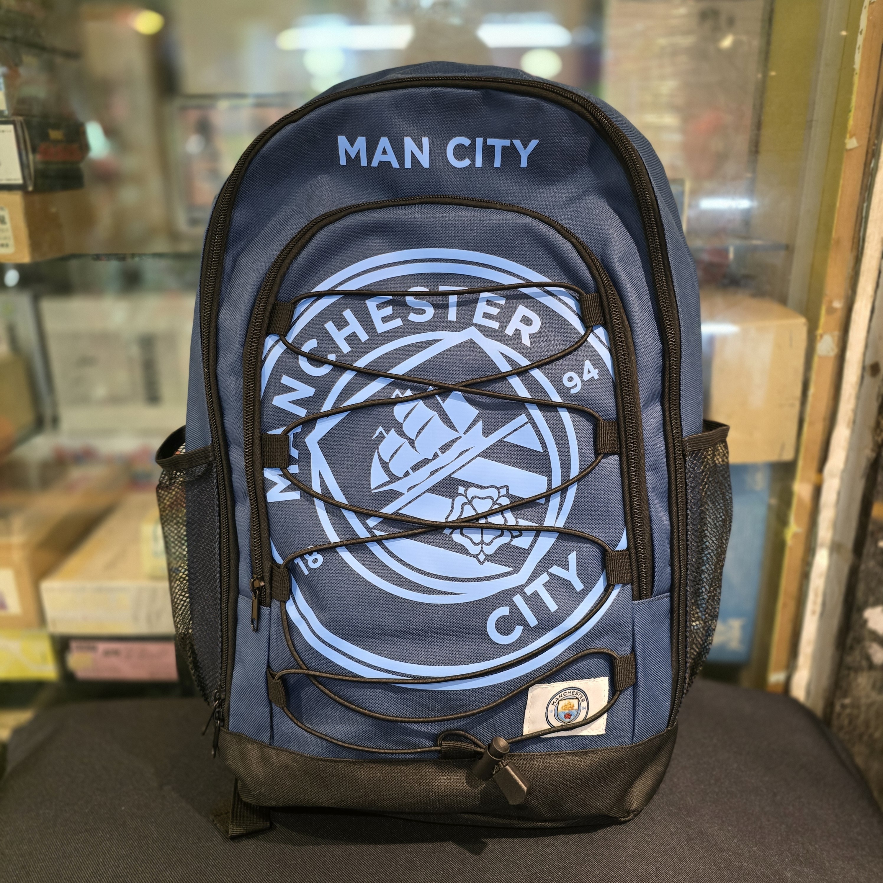 曼城深藍色大會徽彈力繩索背包