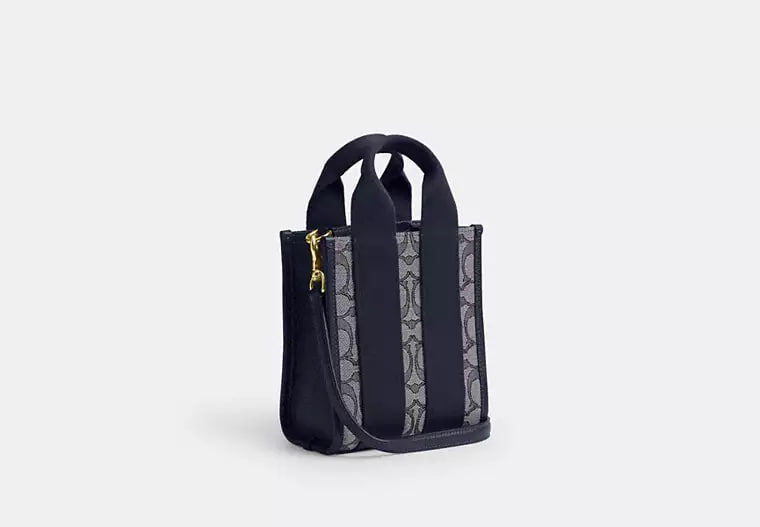 [U] COACH IM/NAVY/MIDNIGHT NAVY CCL75 SMTH MIN TT JCQRD, 196395998067 (UCO168)