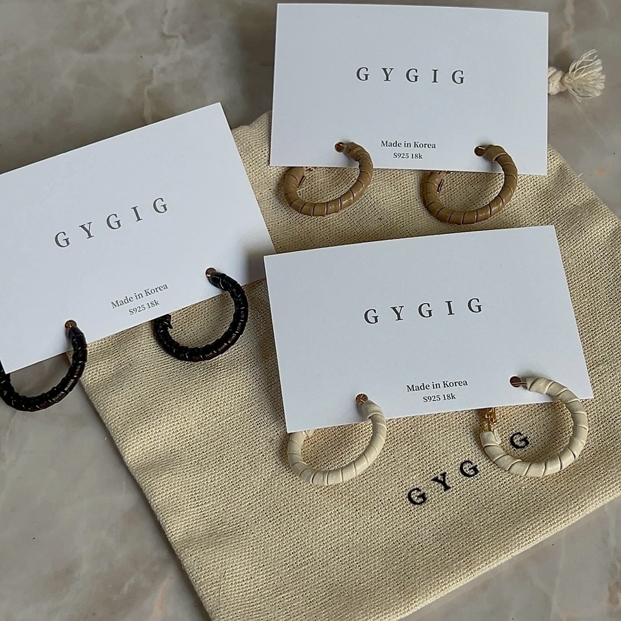 Gy”Pristine重工皮革編織耳釦釘圈