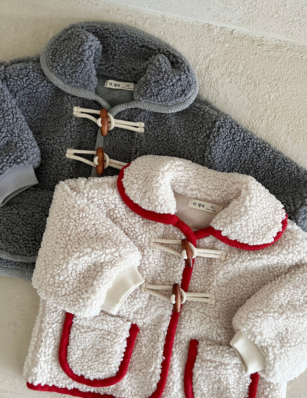 毛毛牛角扣大口袋外套