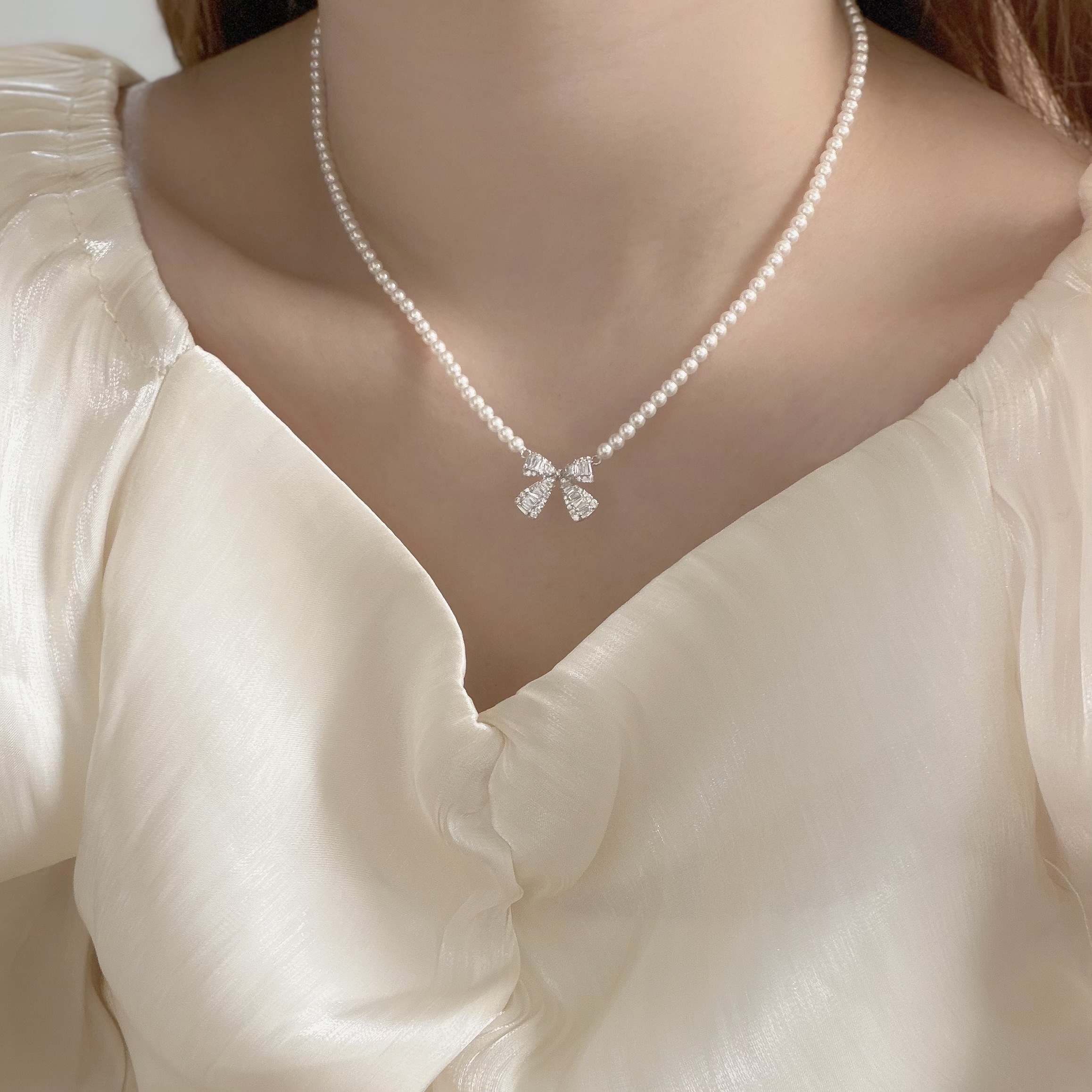 K122鋯石蝴蝶結珍珠頸鏈