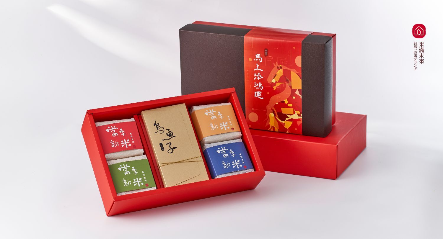 西川米店馬年限定禮盒，內含四色當季新米與烏魚子組合，紅金包裝體面，是春節過年送禮的高質感禮盒。