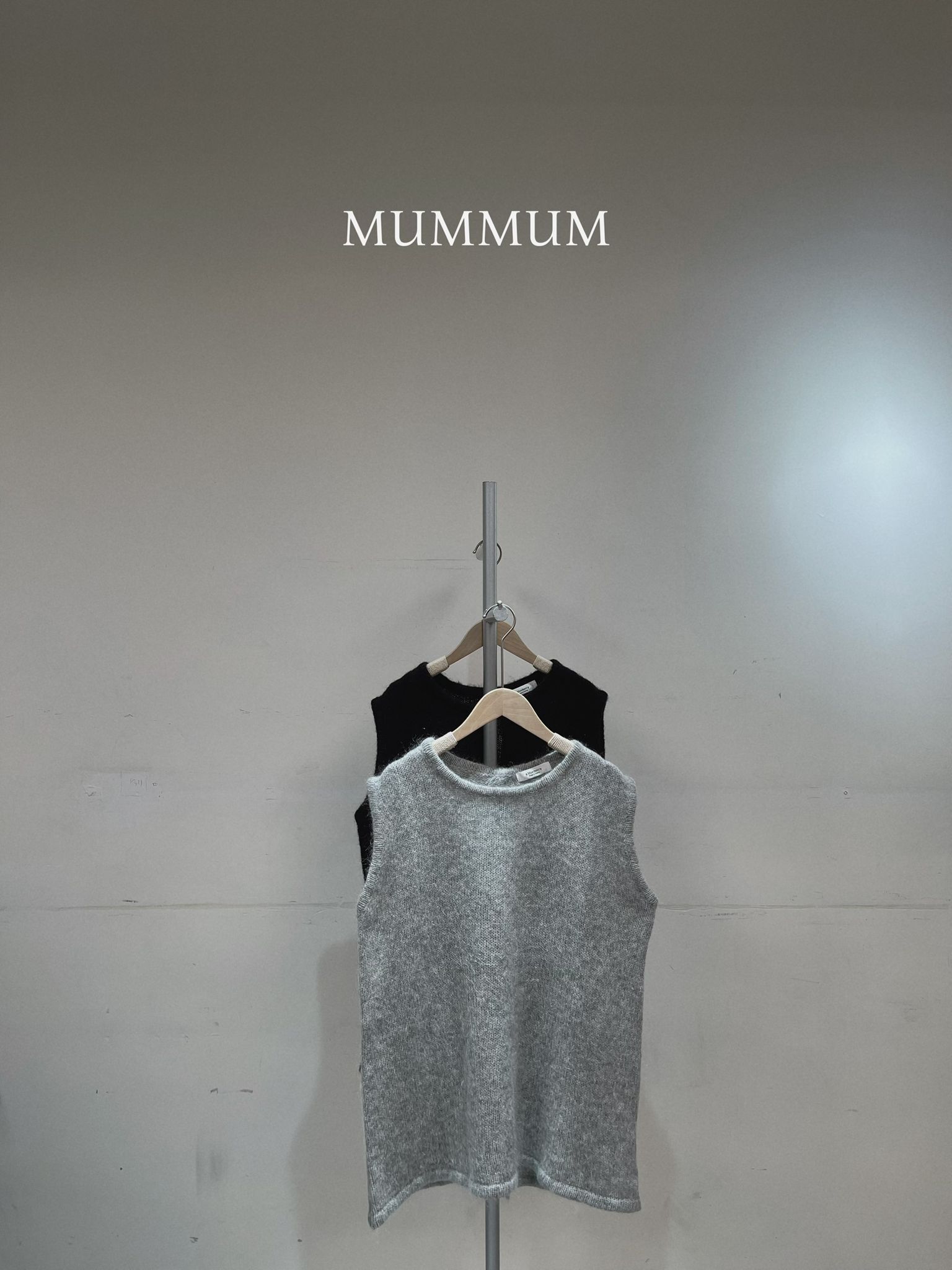 0212912a/背面有鈕扣毛毛背心 44/44/27