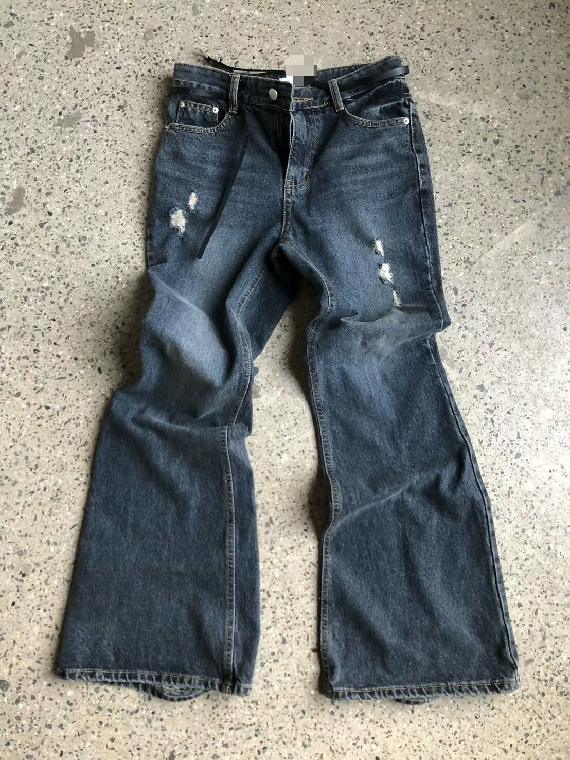 腳跟破損牛仔長褲