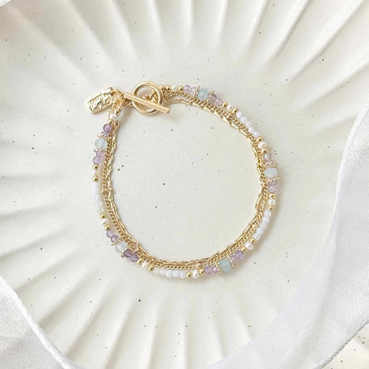 生日花 • 伍月拾參 • 聚合草 – 海藍紫水晶 – 手鍊