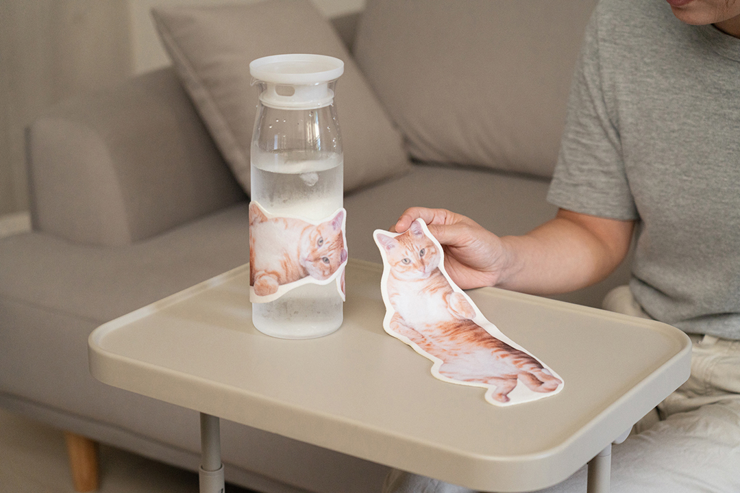 可愛橘貓圖案的杯套