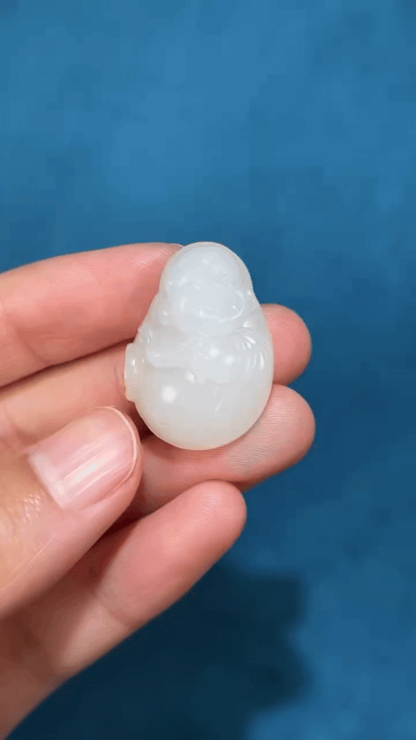 1126240 和田玉籽料笑佛