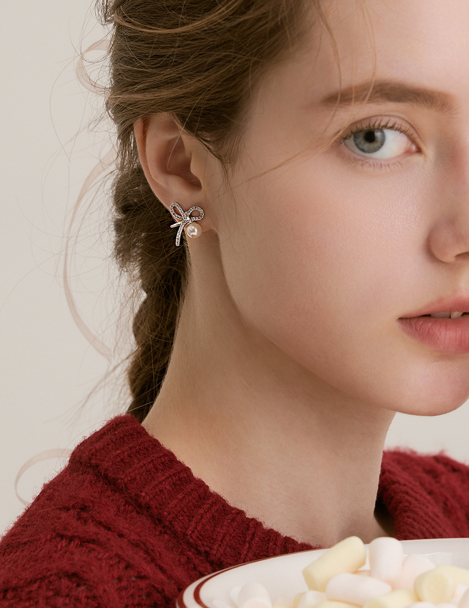 璀璨蝴蝶結珍珠。針式耳環