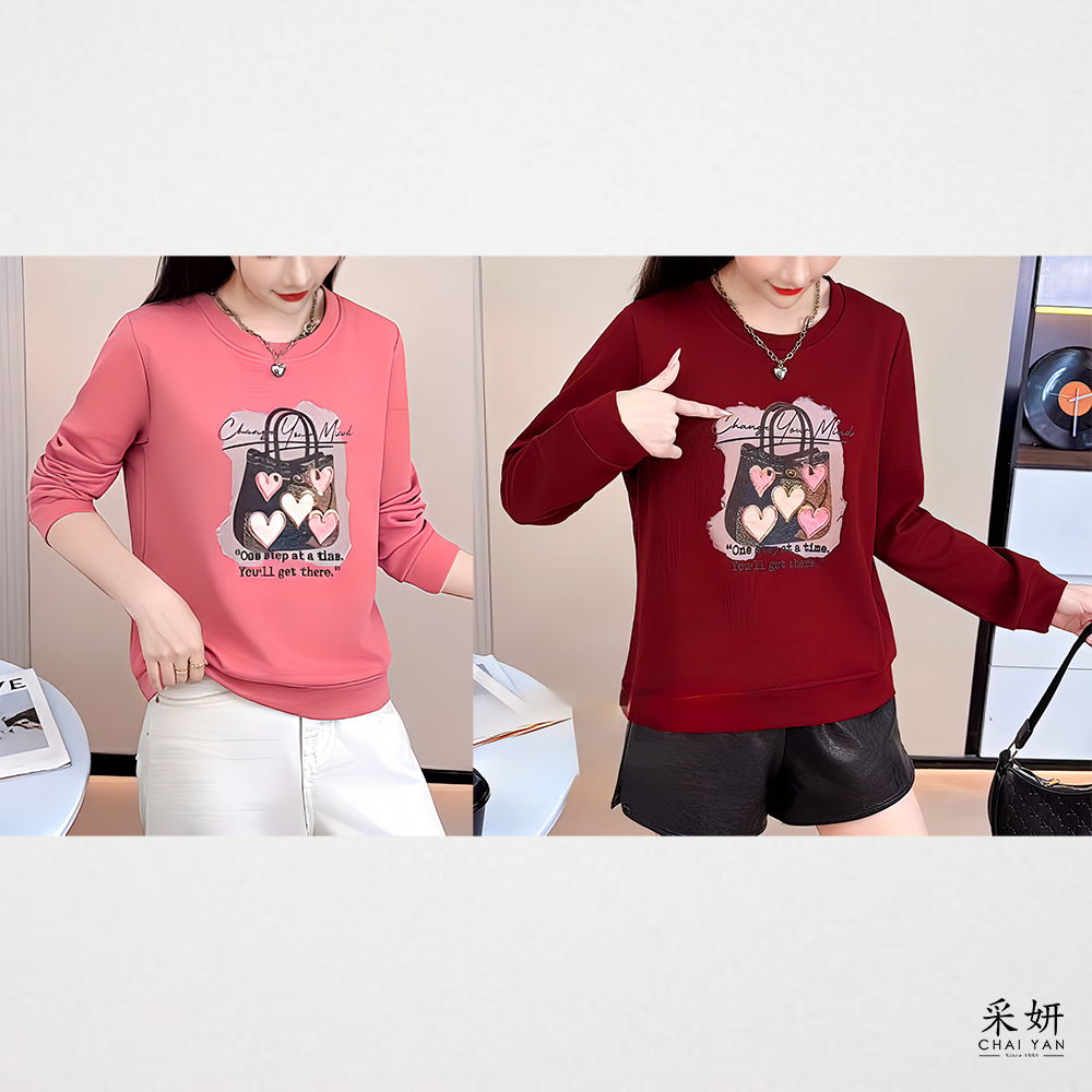 愛心亮片縫線包包印花長袖上衣