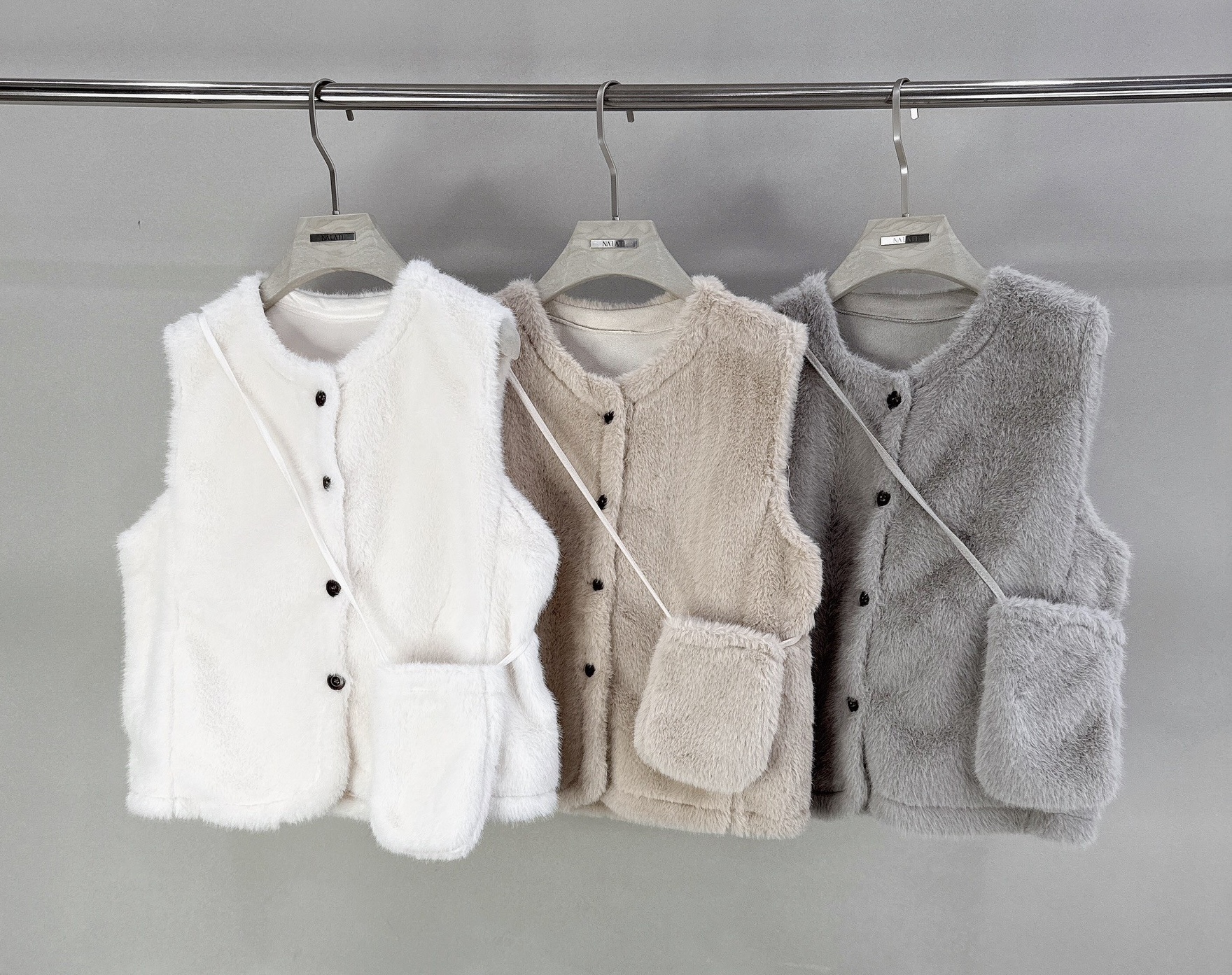 整件毛毛排釦背心+包包