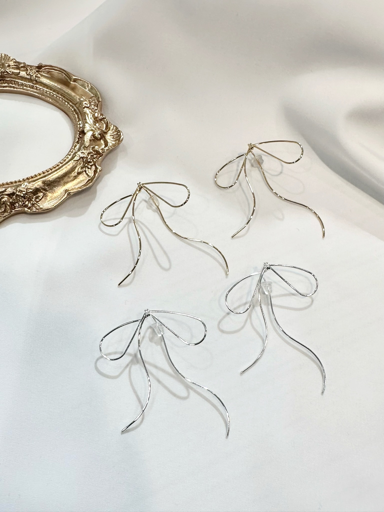 蝴蝶結細絲耳環