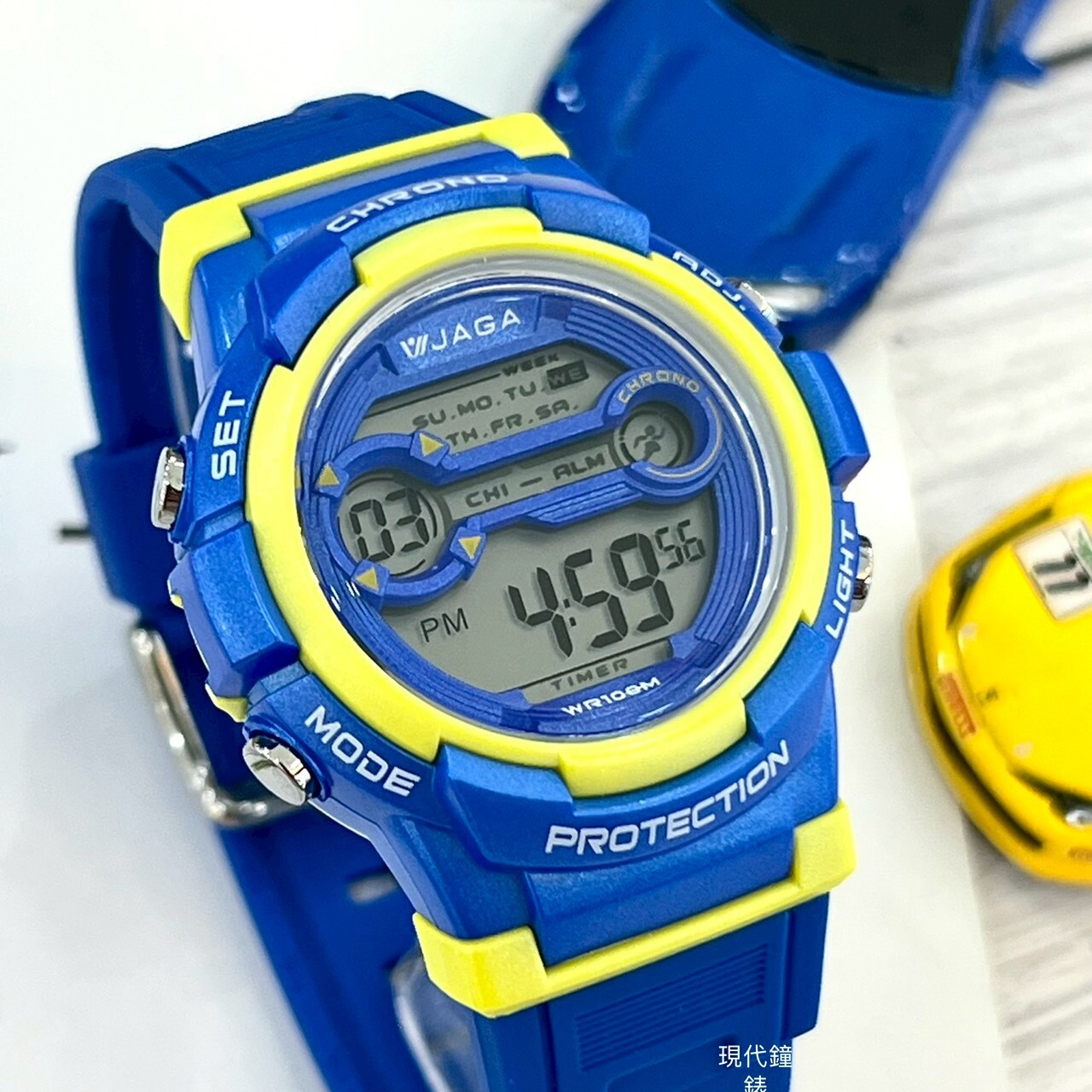 【JAGA 捷卡】色彩繽紛花漾年華多功能電子錶-藍黃 M1126-EK 40mm 現代鐘錶