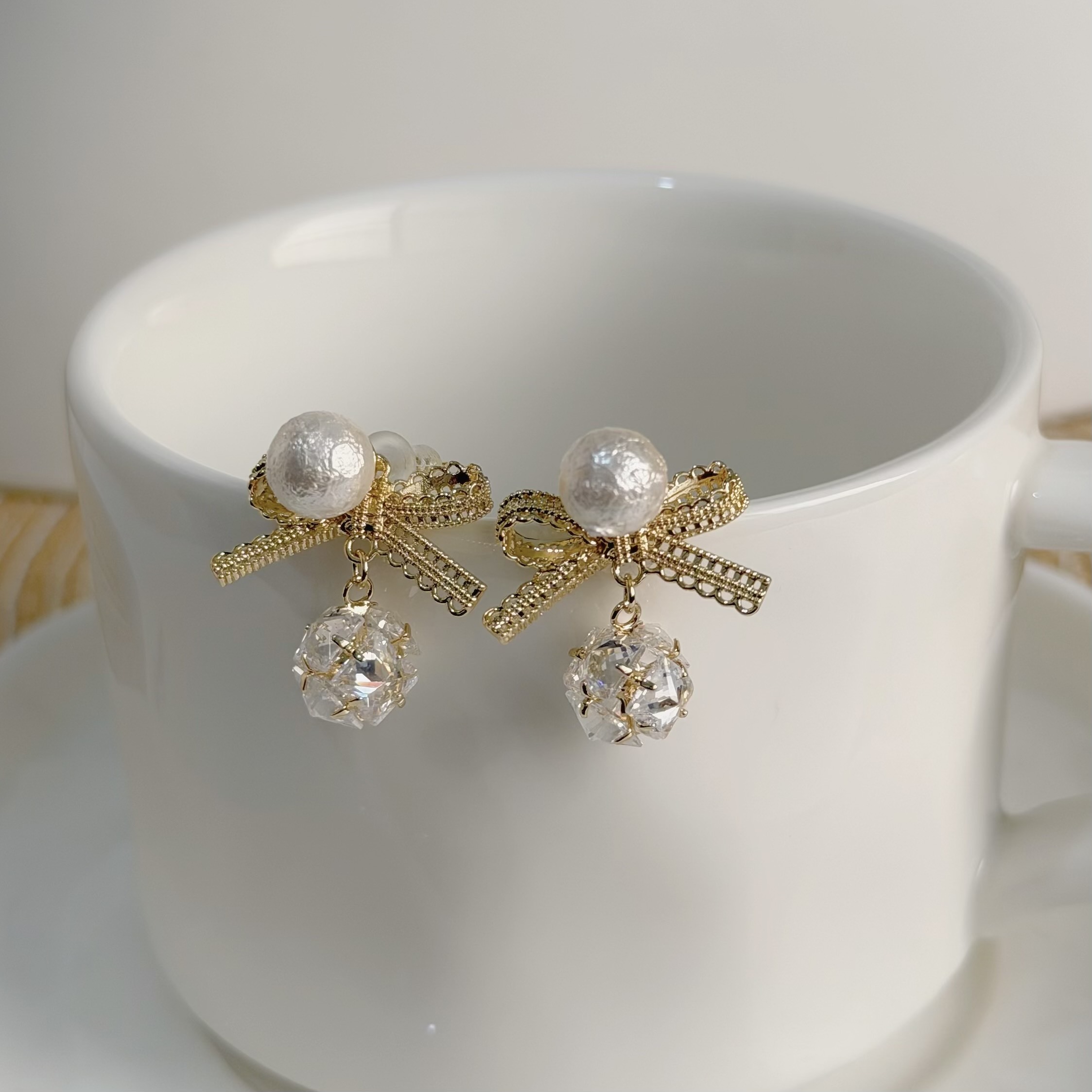 Z203蕾絲蝴蝶結珍珠前後扣垂吊