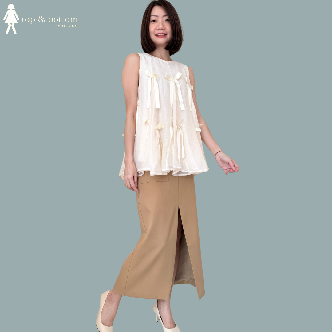 SLEEVELESS ORGANZA FLARE LONG BLOUSE WITH 3D RIBBON