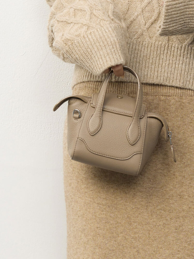 * 迷你真皮笑臉包