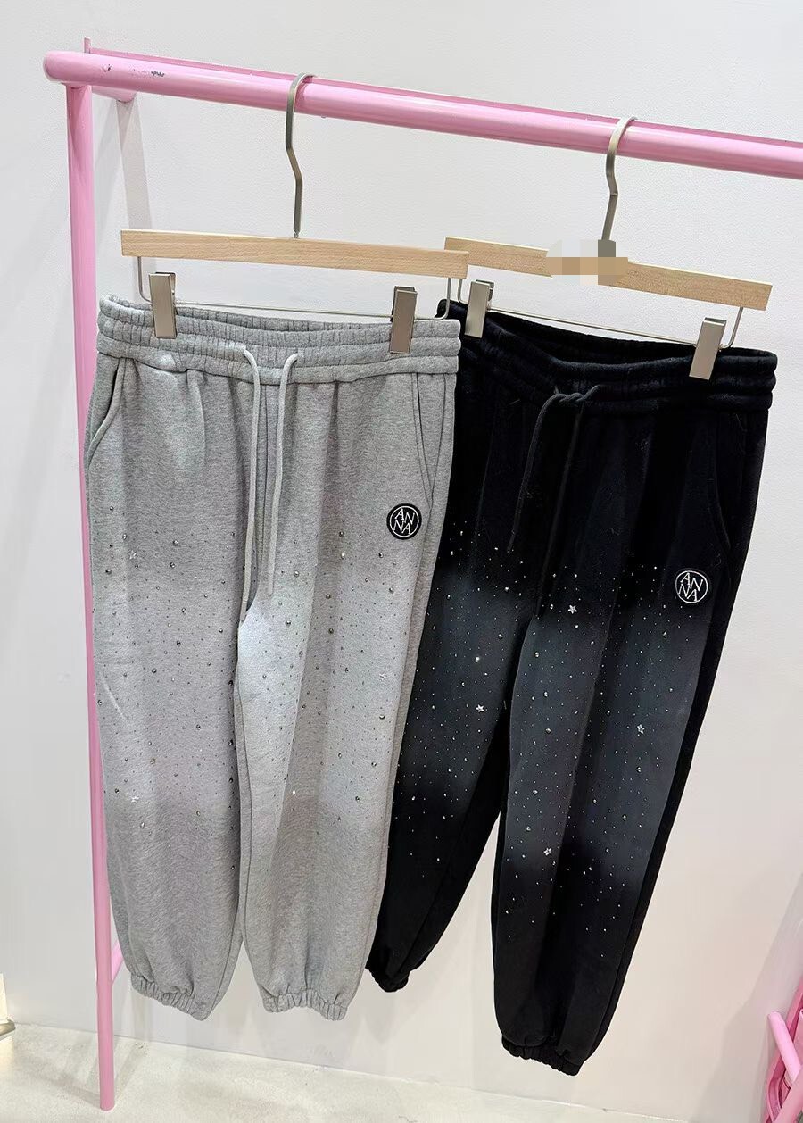 刷色亮鉚釘休閒褲