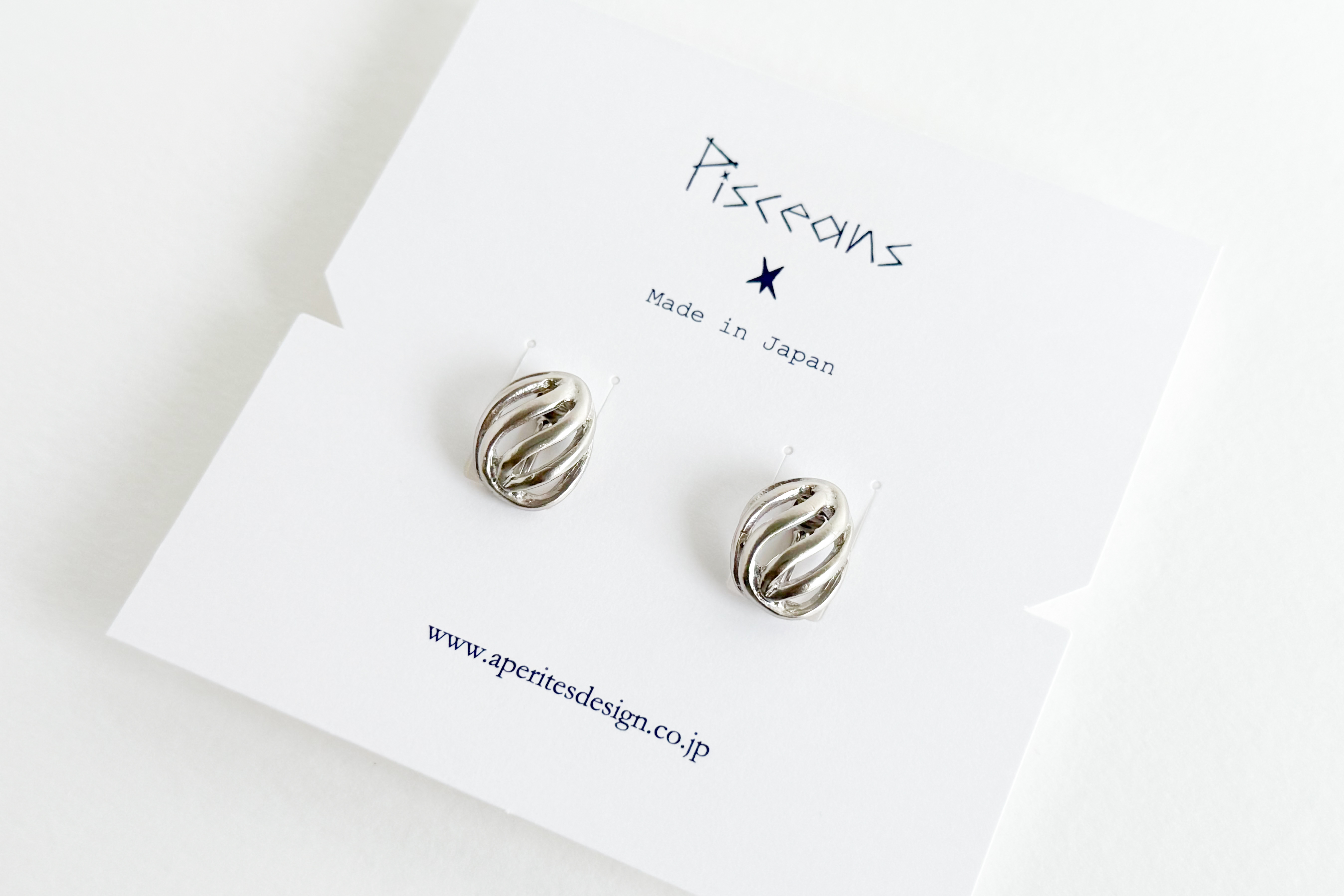 Pisceans-流線鏤空半球夾式耳環 SV