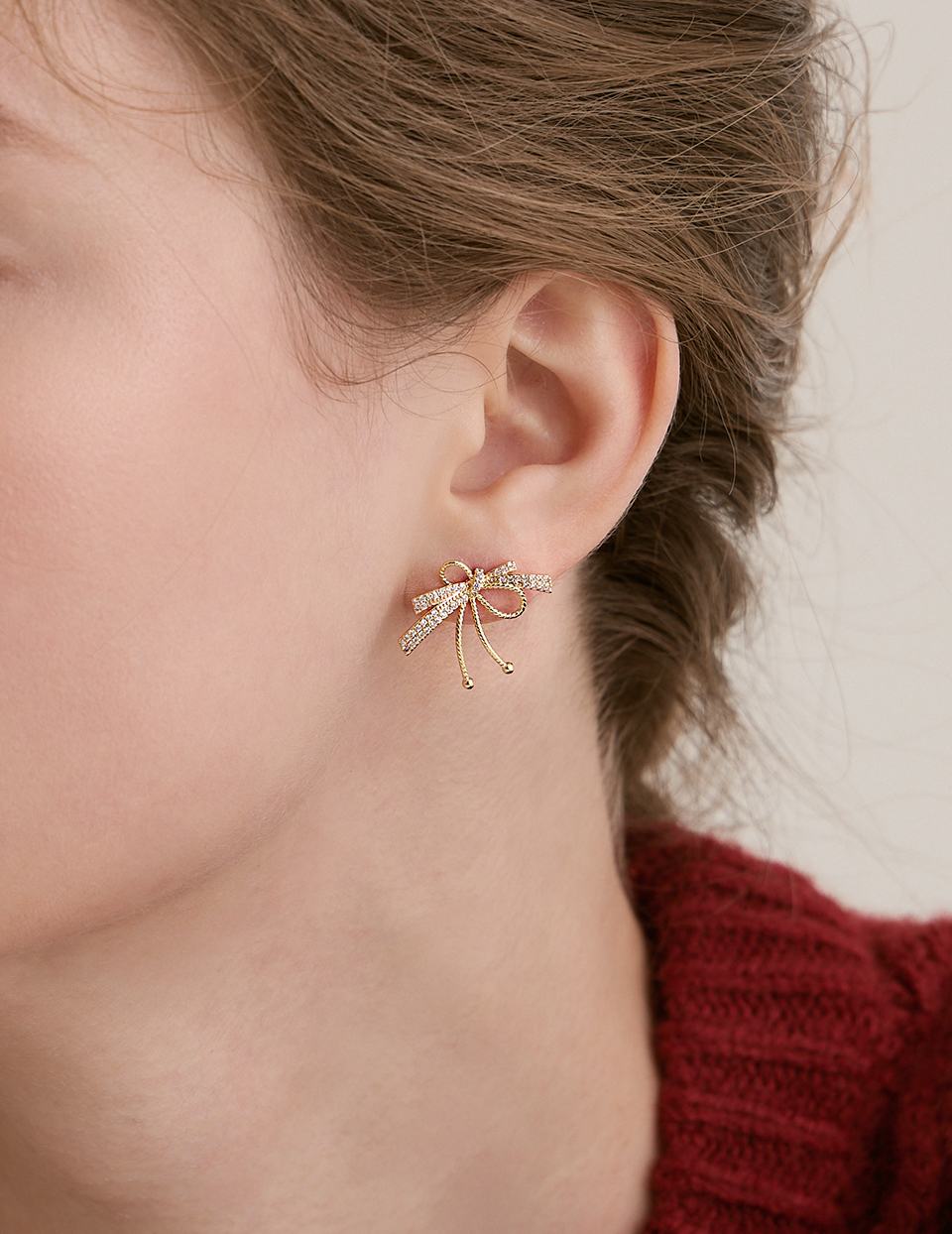 輕奢蝴蝶結線條。銀針耳環(金)