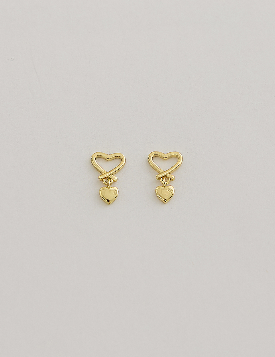 雙心垂墜。針式耳環