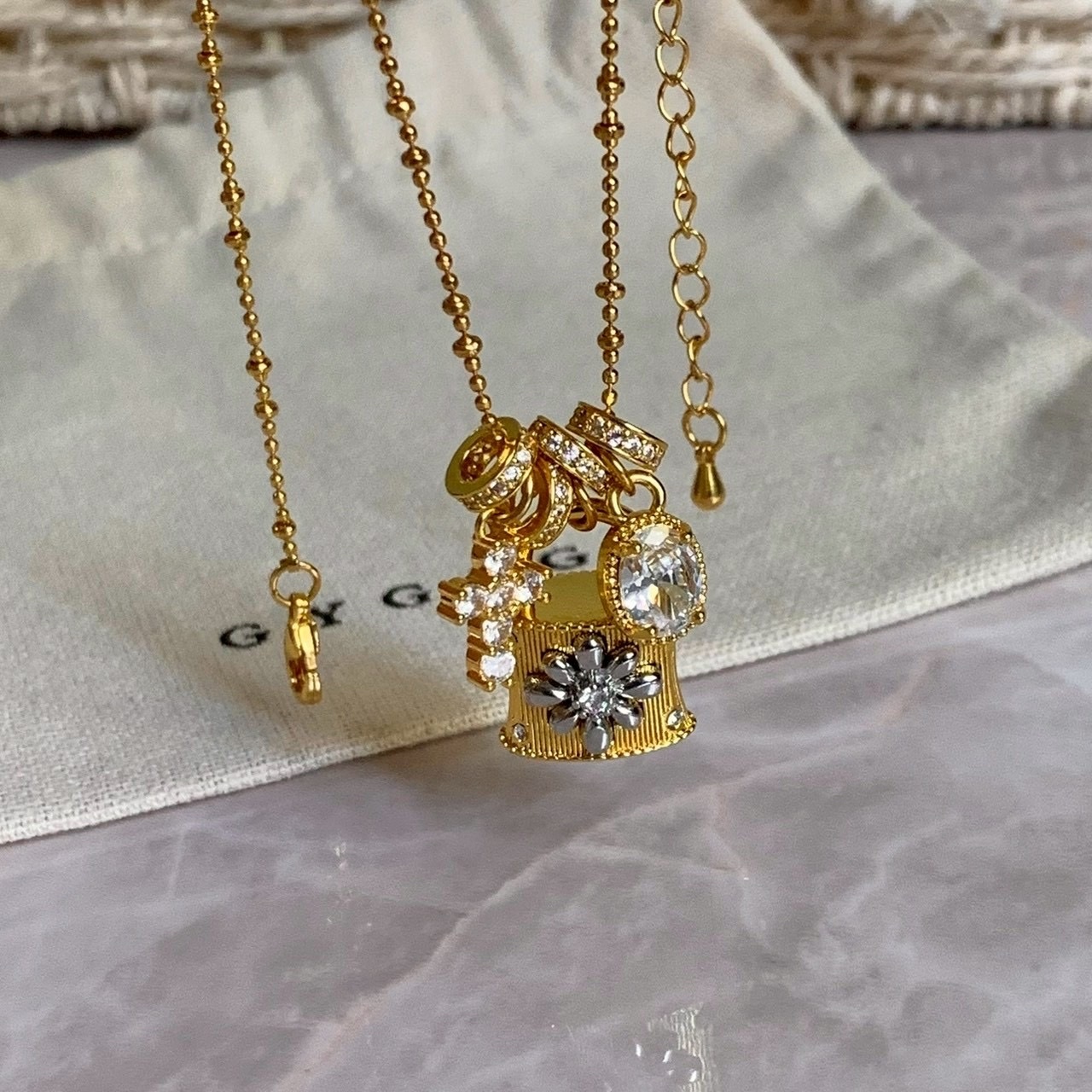 Gy”radiant 金銀雛菊十字鑽多環重工項鍊