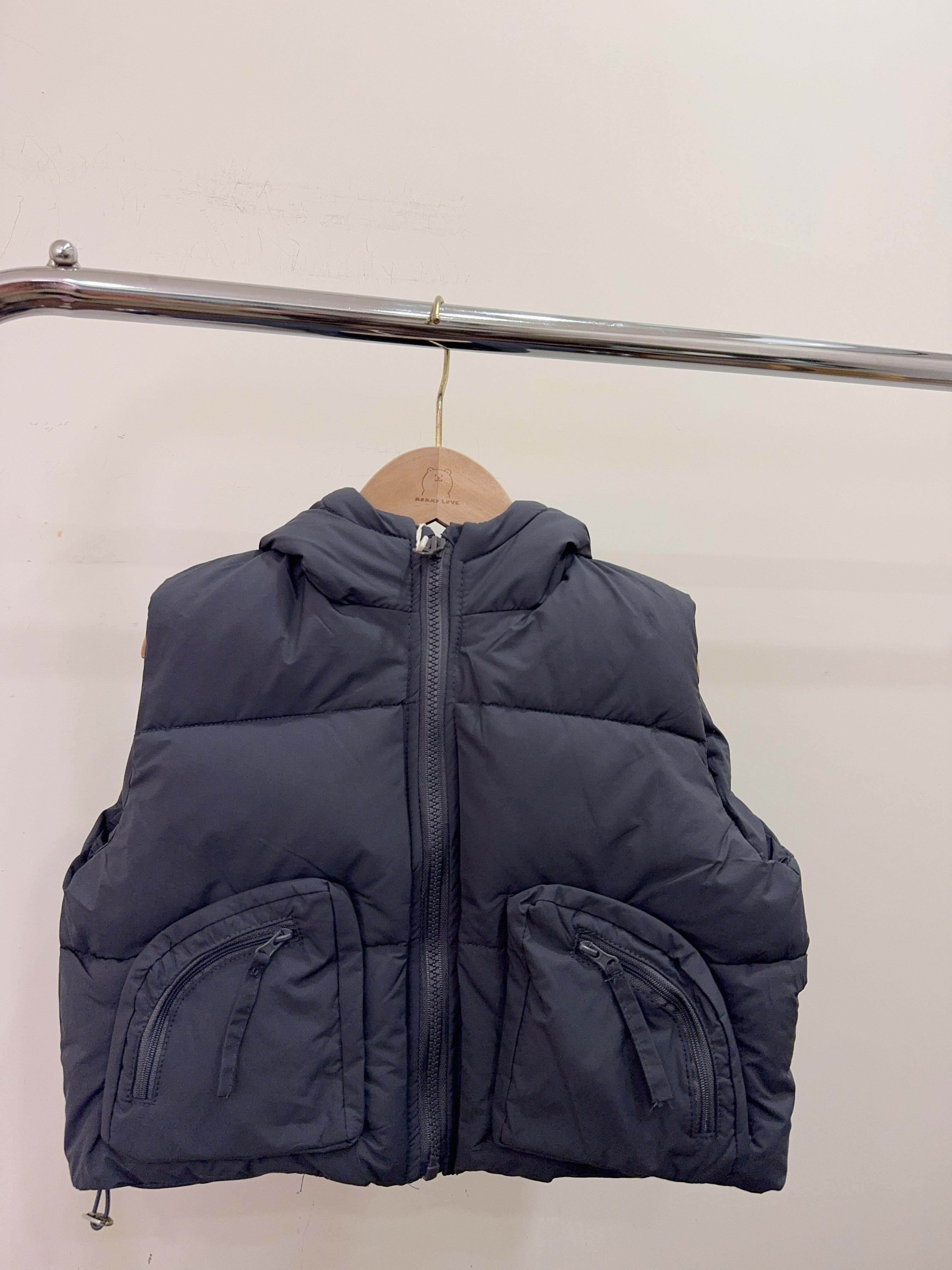 NH6760扇型口袋背後字母連帽背心