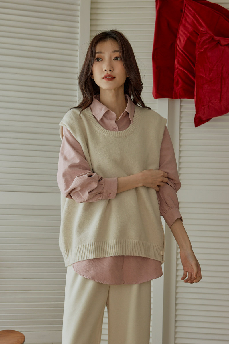 造型側排釦袖捲邊背心