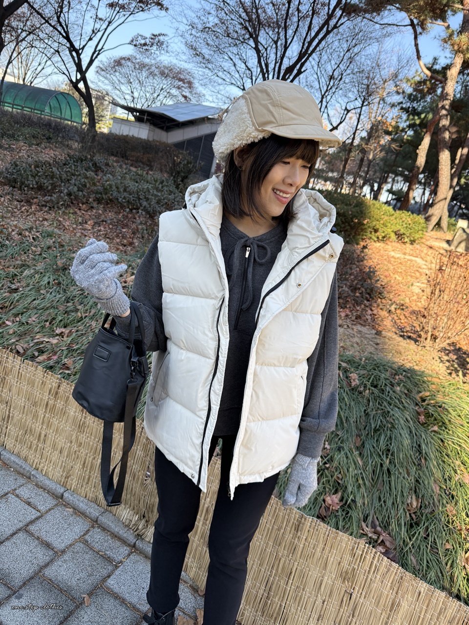 正韓低調保暖拉鍊鋪釘釦背心 (白)