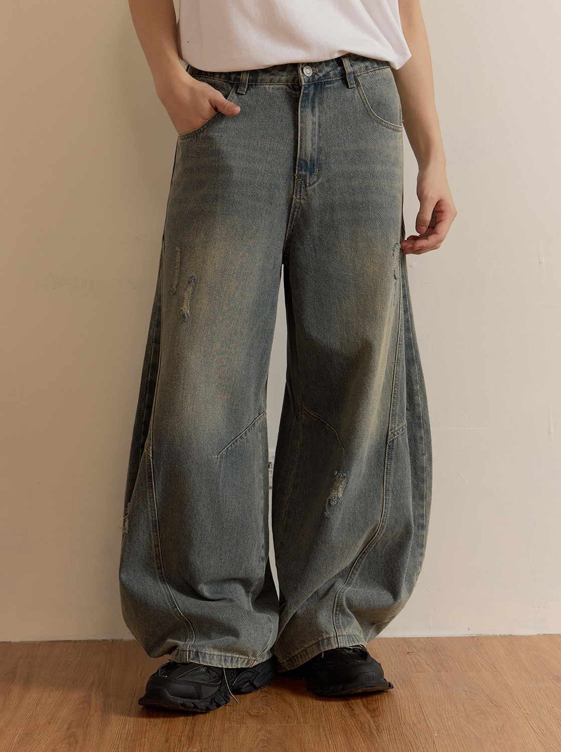 解構剪接刷破牛仔彎刀褲