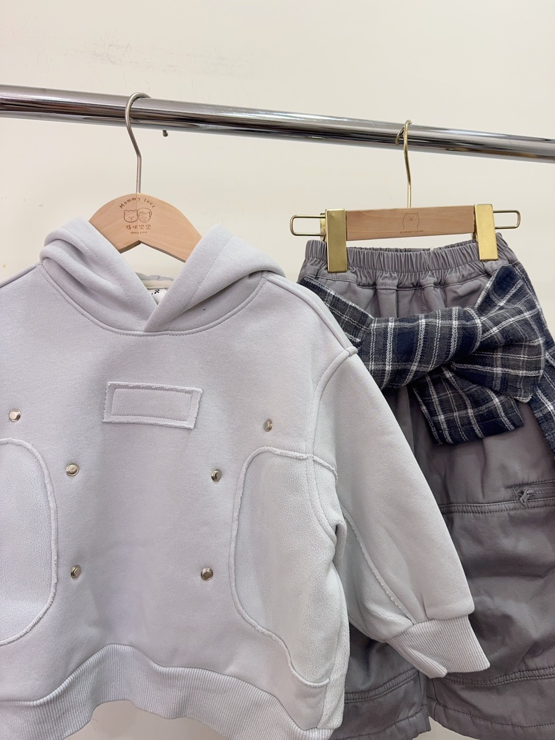 53056卯釘異材質接拼連帽上衣