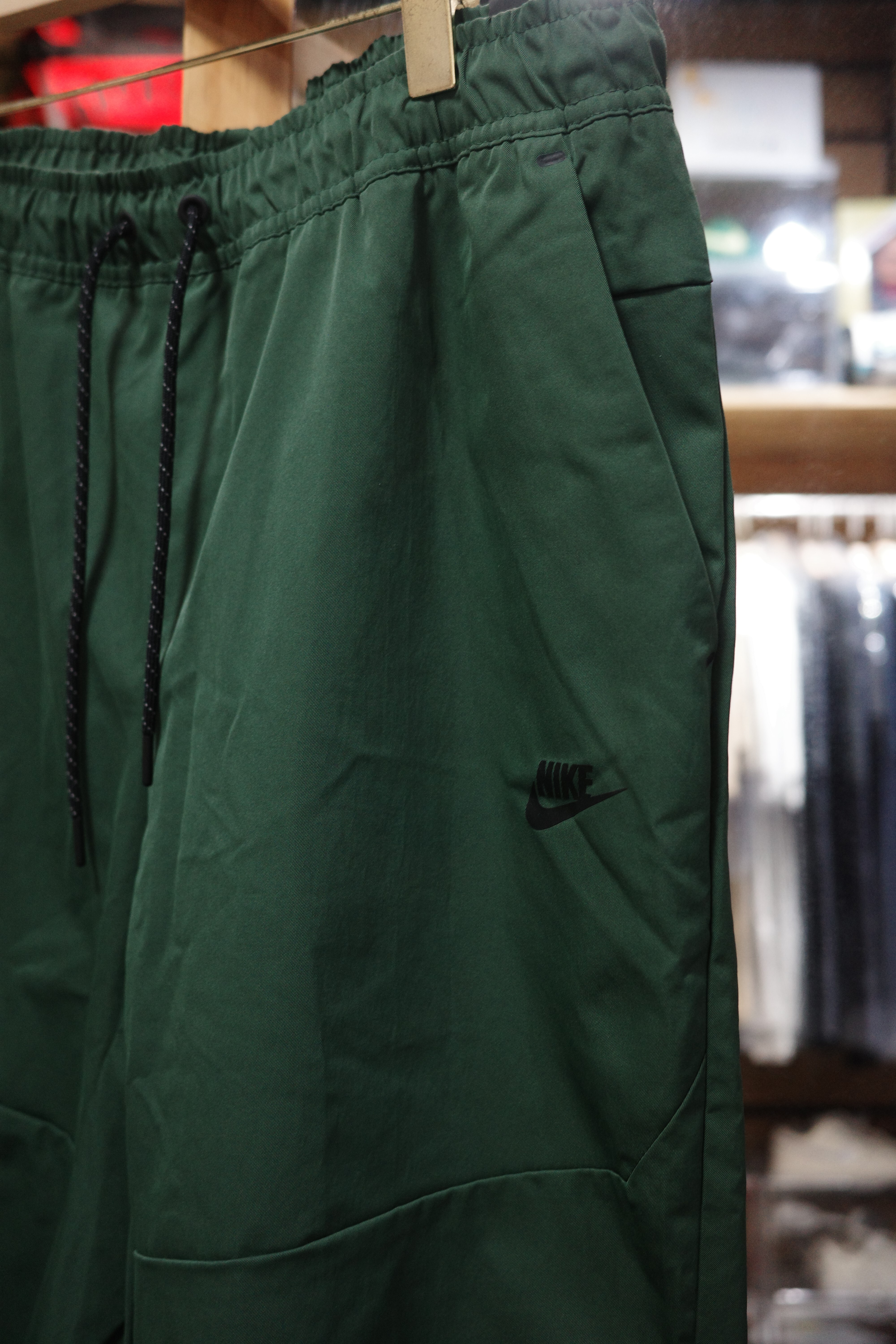 NIKE NSW 防潑水 軍綠長褲 CU4484-010 337