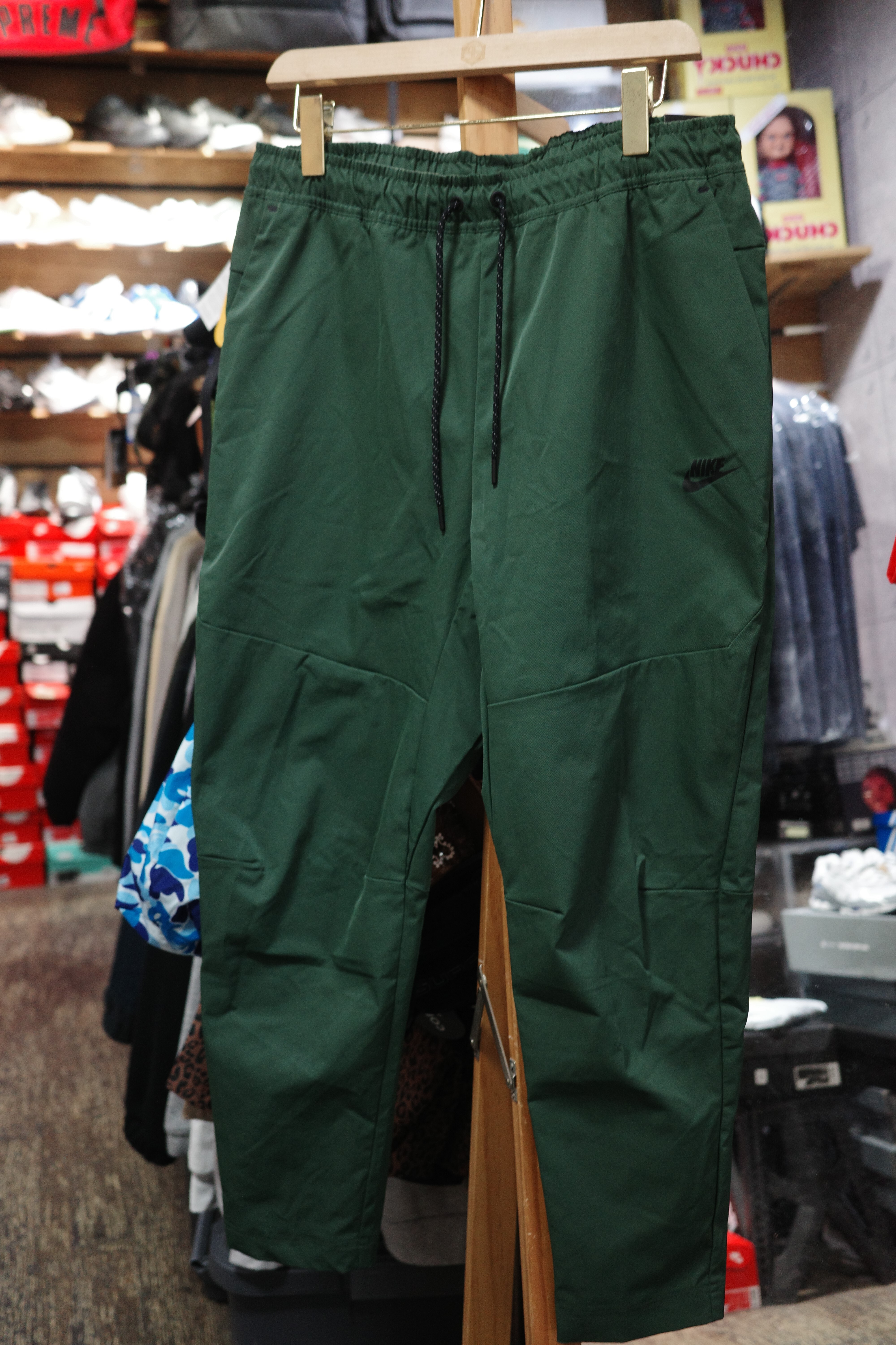 NIKE NSW 防潑水 軍綠長褲 CU4484-010 337