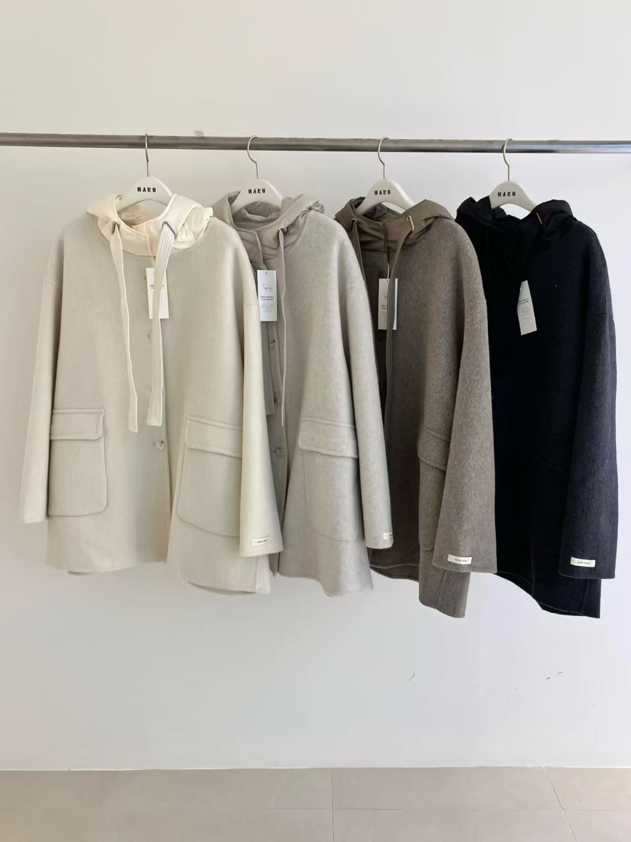 HU5338 拼接帽中長口袋外套