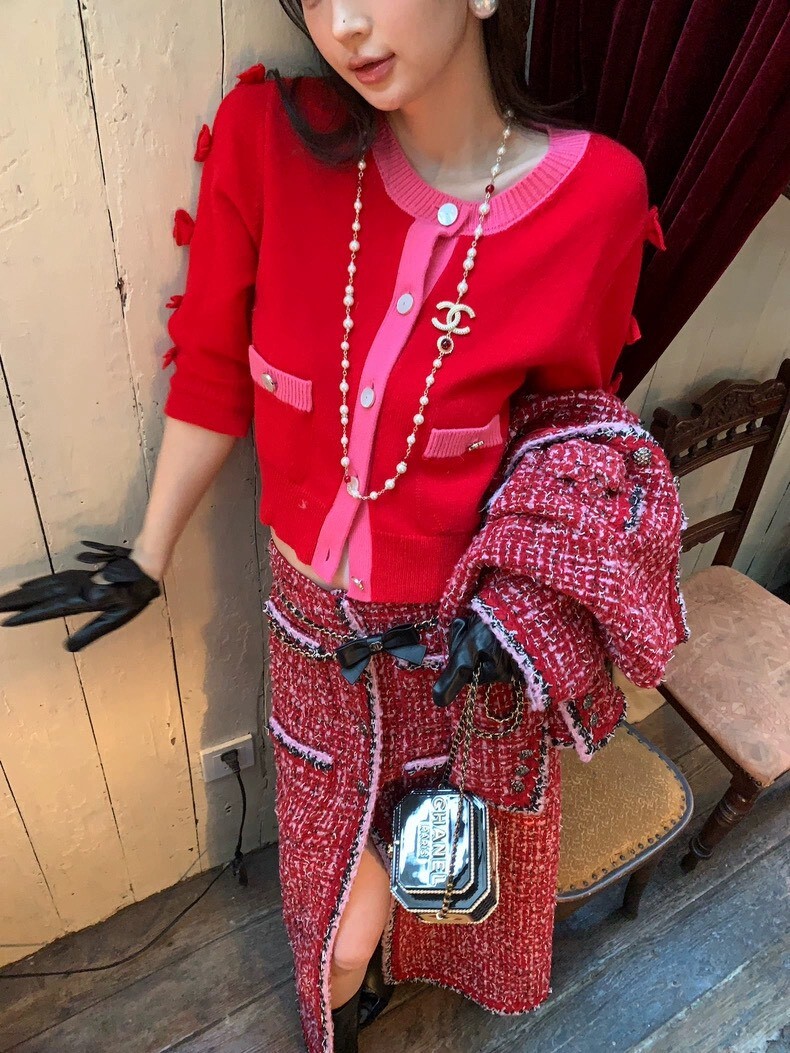 設計師家紅配桃邊袖鏤空蝴蝶結針織上衣