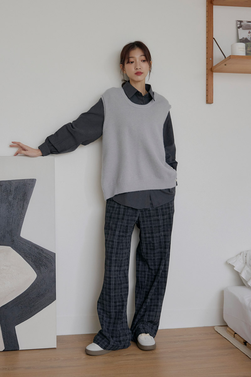 造型側排釦袖捲邊背心