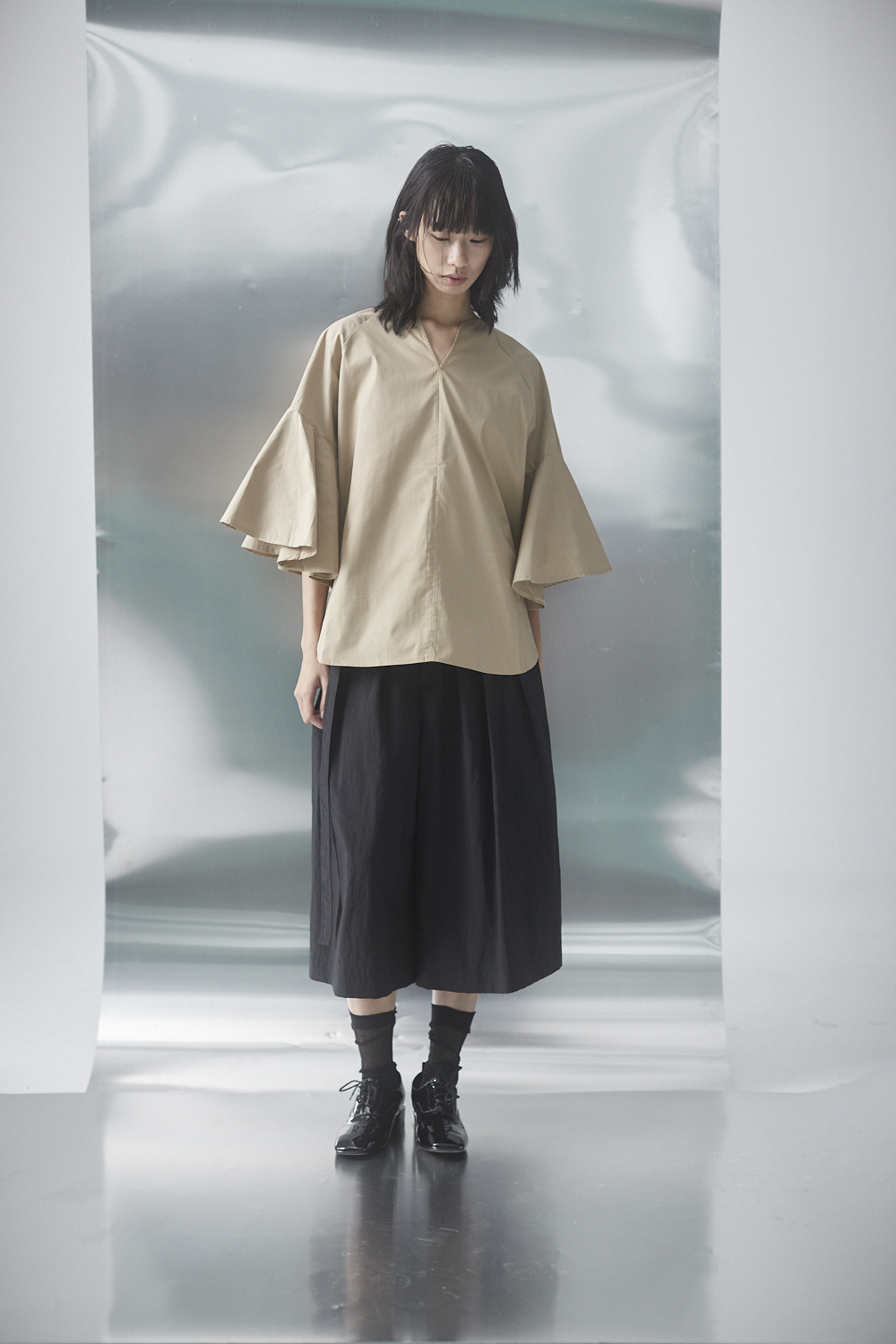 黑色打摺七分寬褲