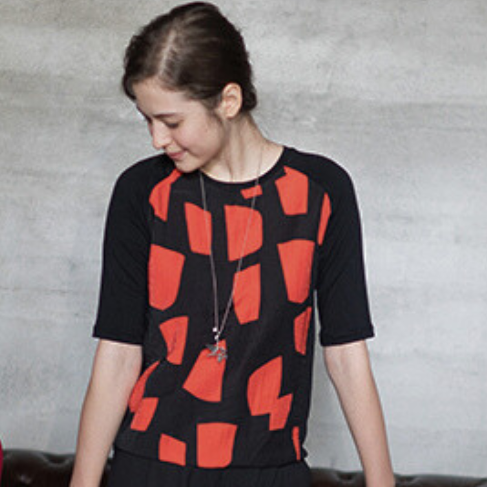 PIPPY 色塊印花剪接圓領五分袖上衣 橘