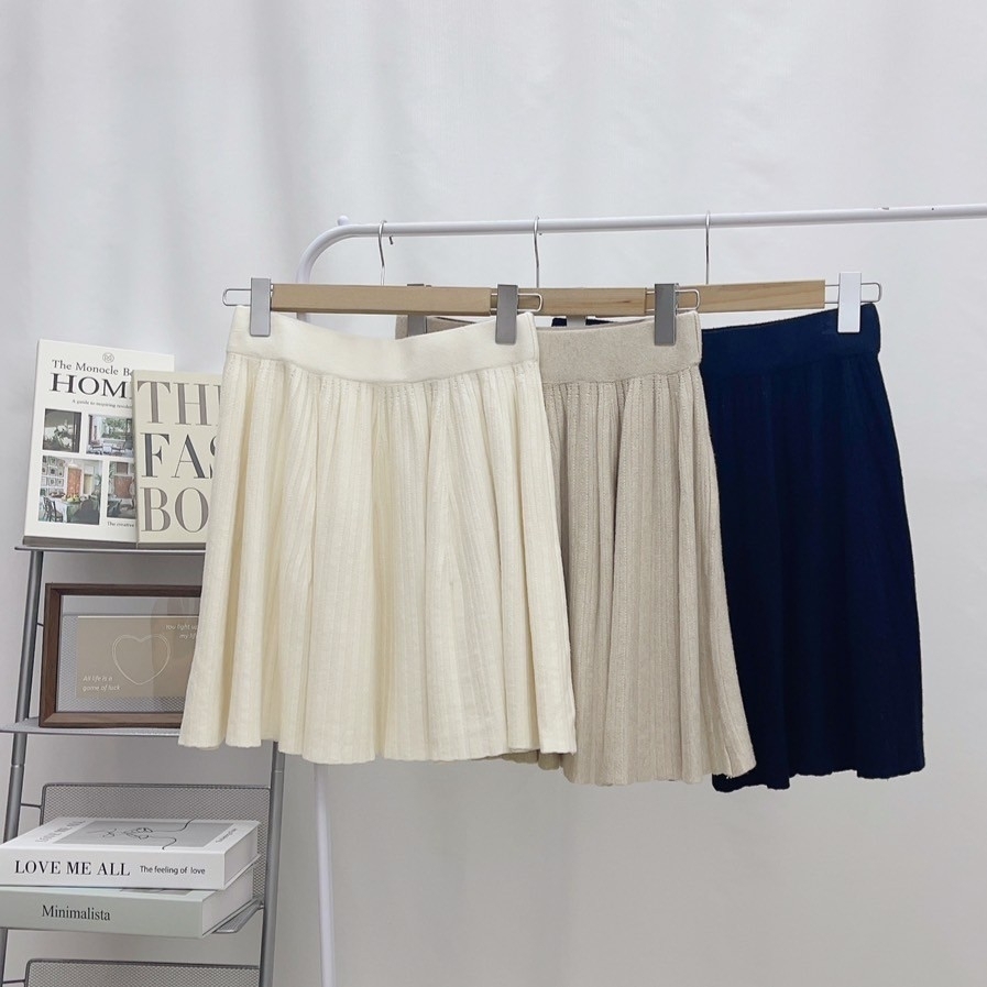 7073-細壓折散擺針織短裙