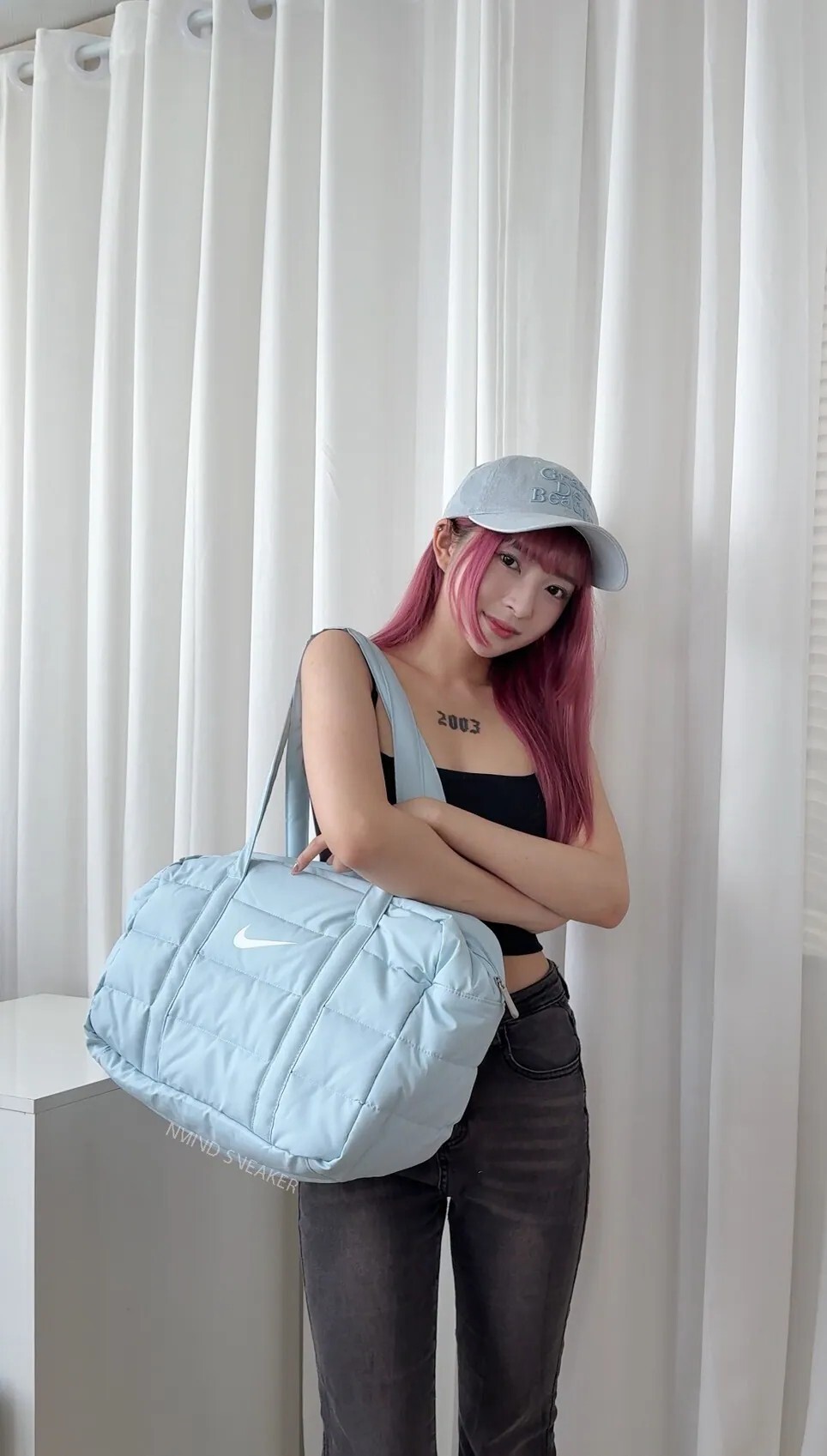 NG品-NIKE 空氣感枕頭羽絨包 防水 水藍色