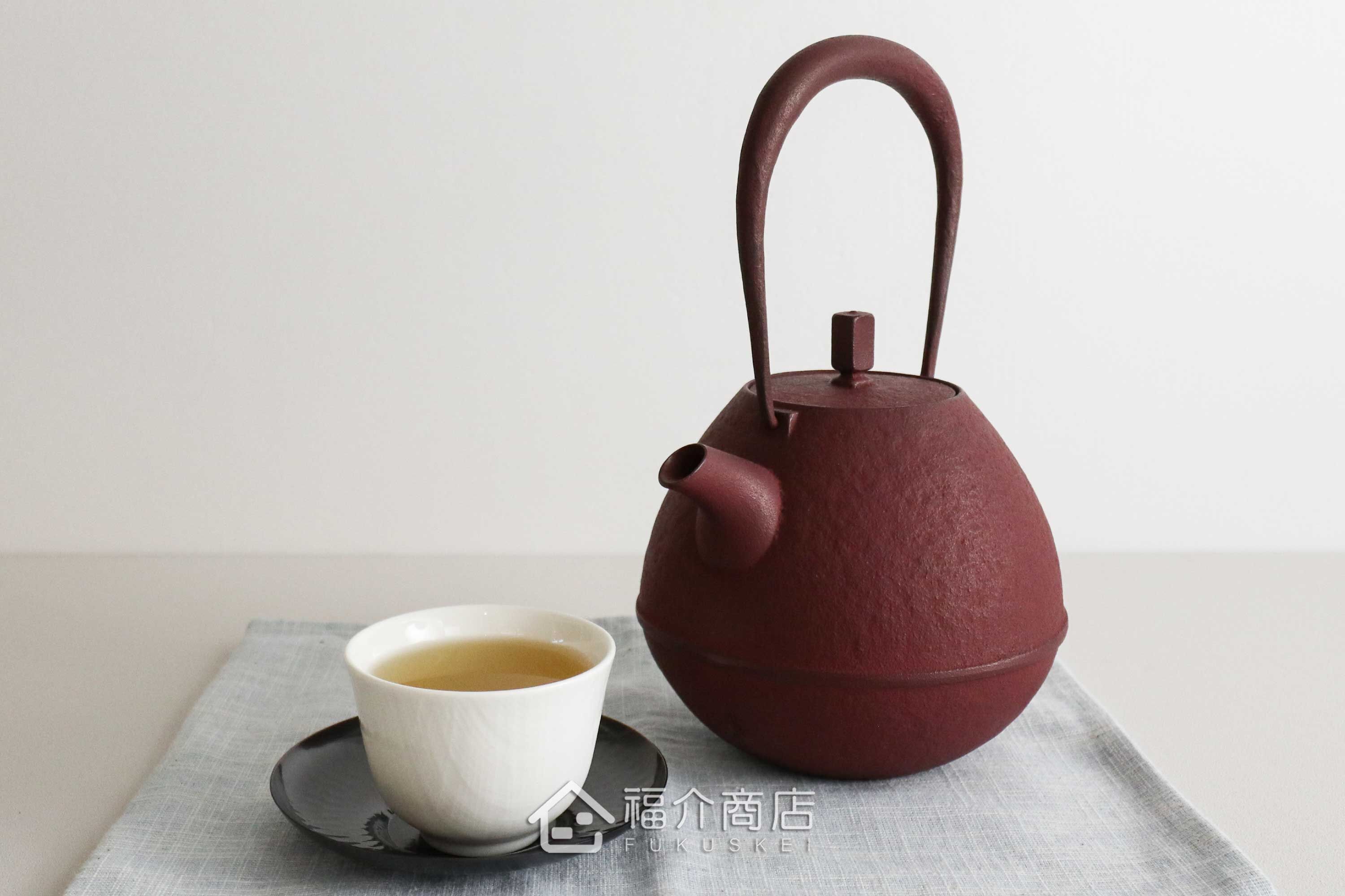 煮水泡茶用的鑄鐵材質紅色鐵壺