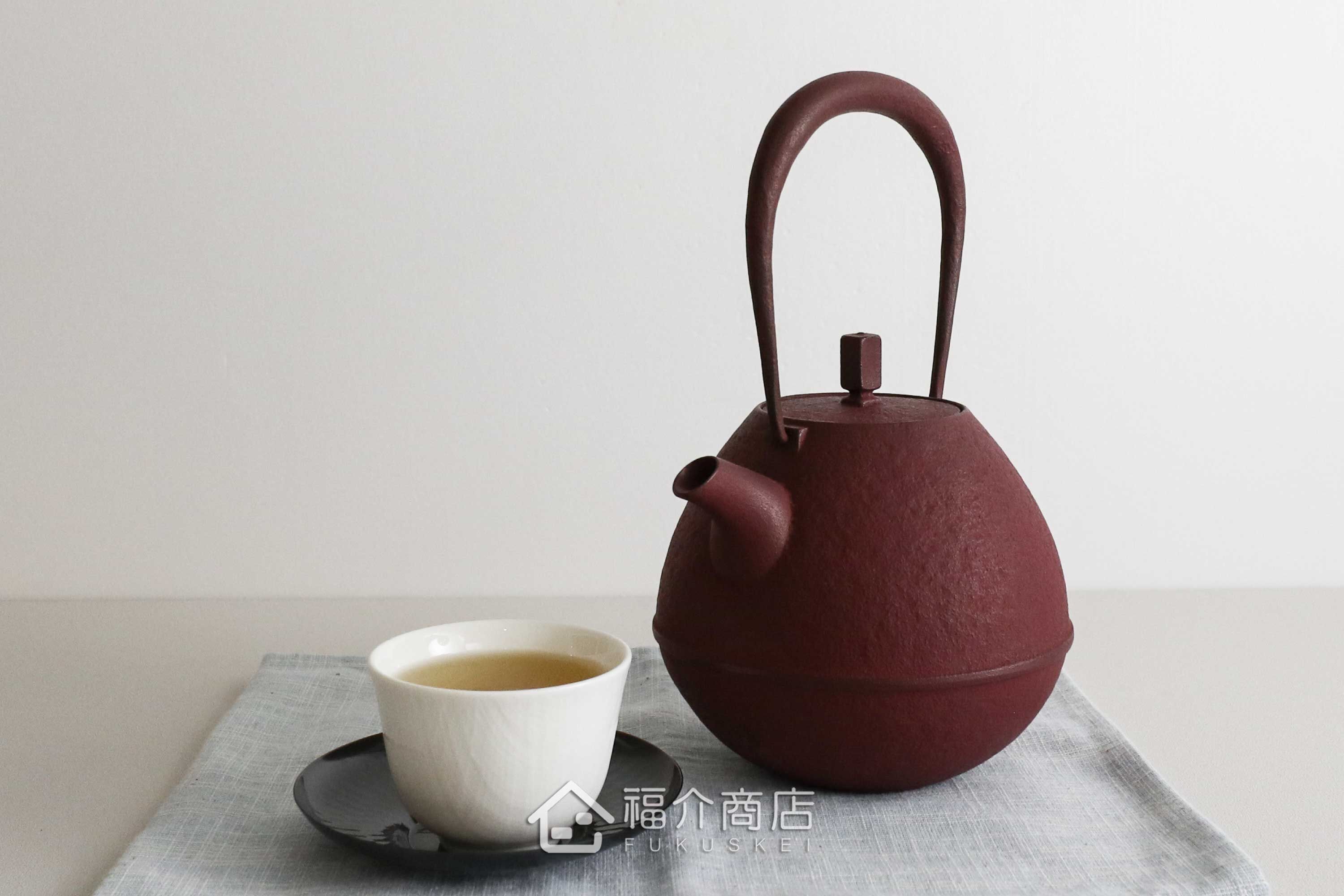 煮水泡茶用的鑄鐵材質紅色鐵壺