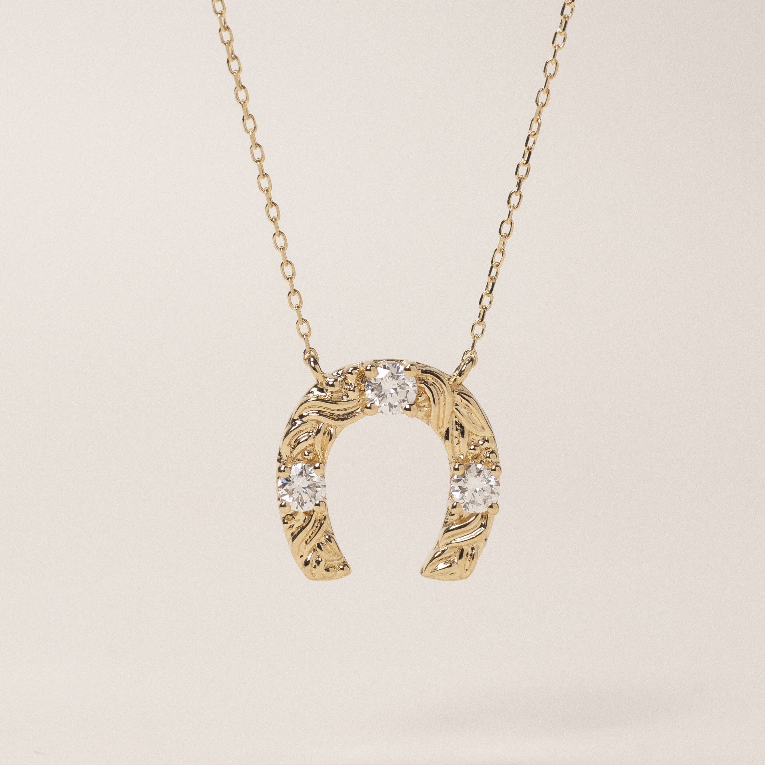 18K Golden Saddle Diamond Necklace