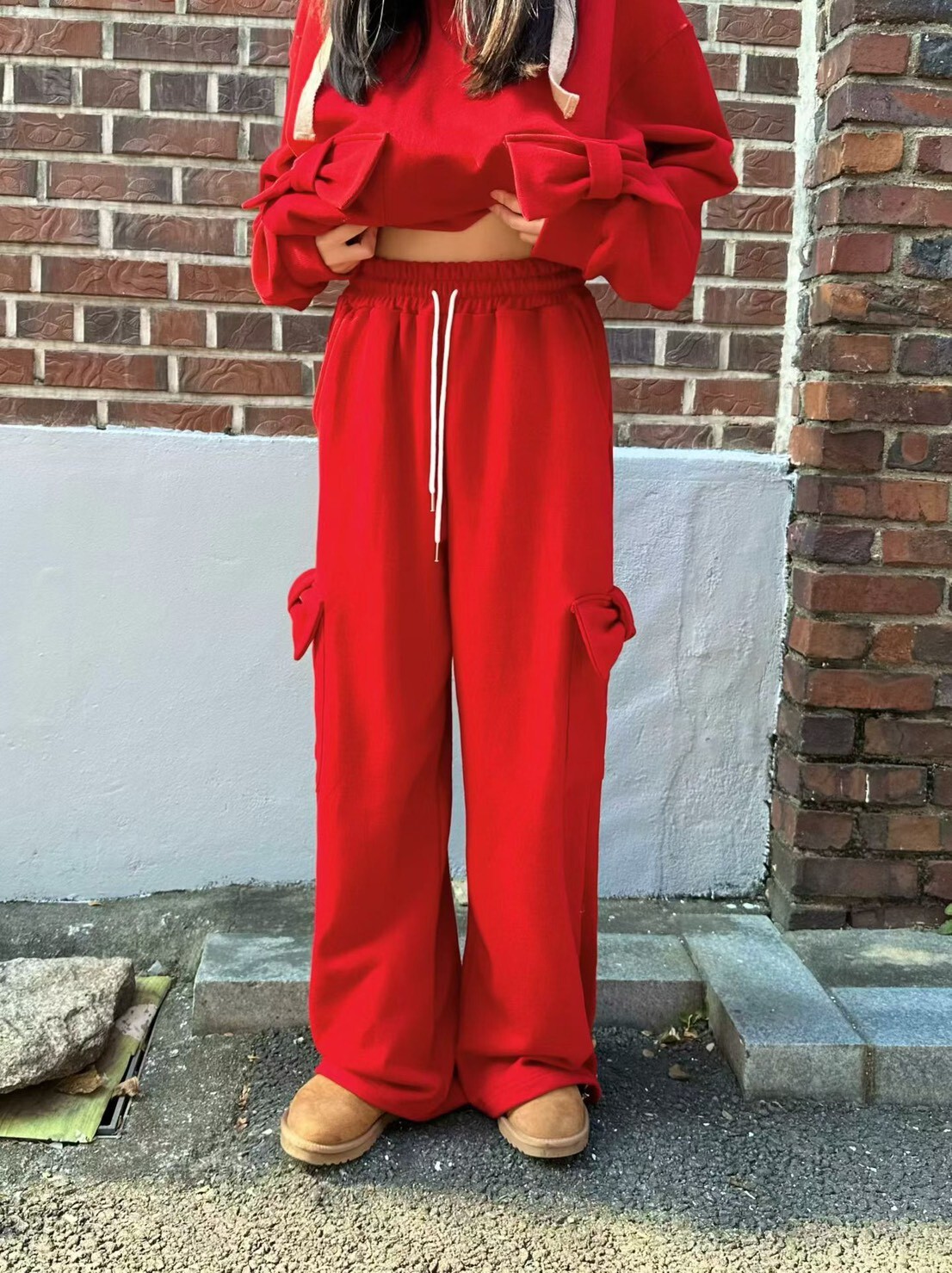 蝴蝶結側口袋休閒長褲