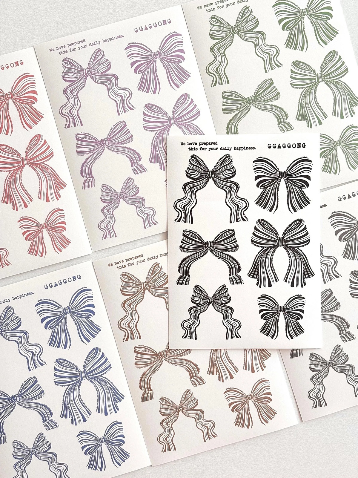 韓國 ggaggong．線條蝴蝶結 模造紙貼紙包