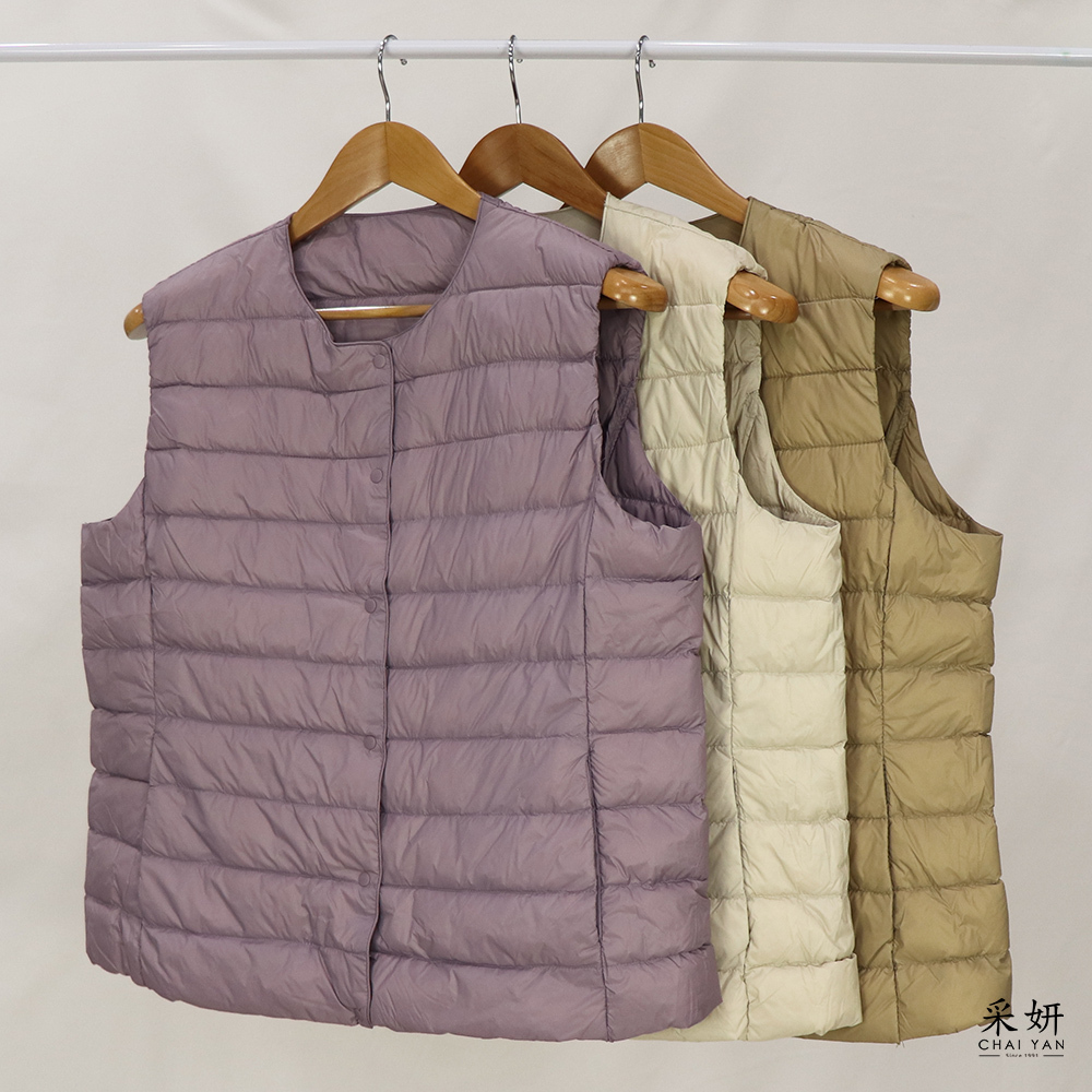 可收納中舖棉防風壓釦背心