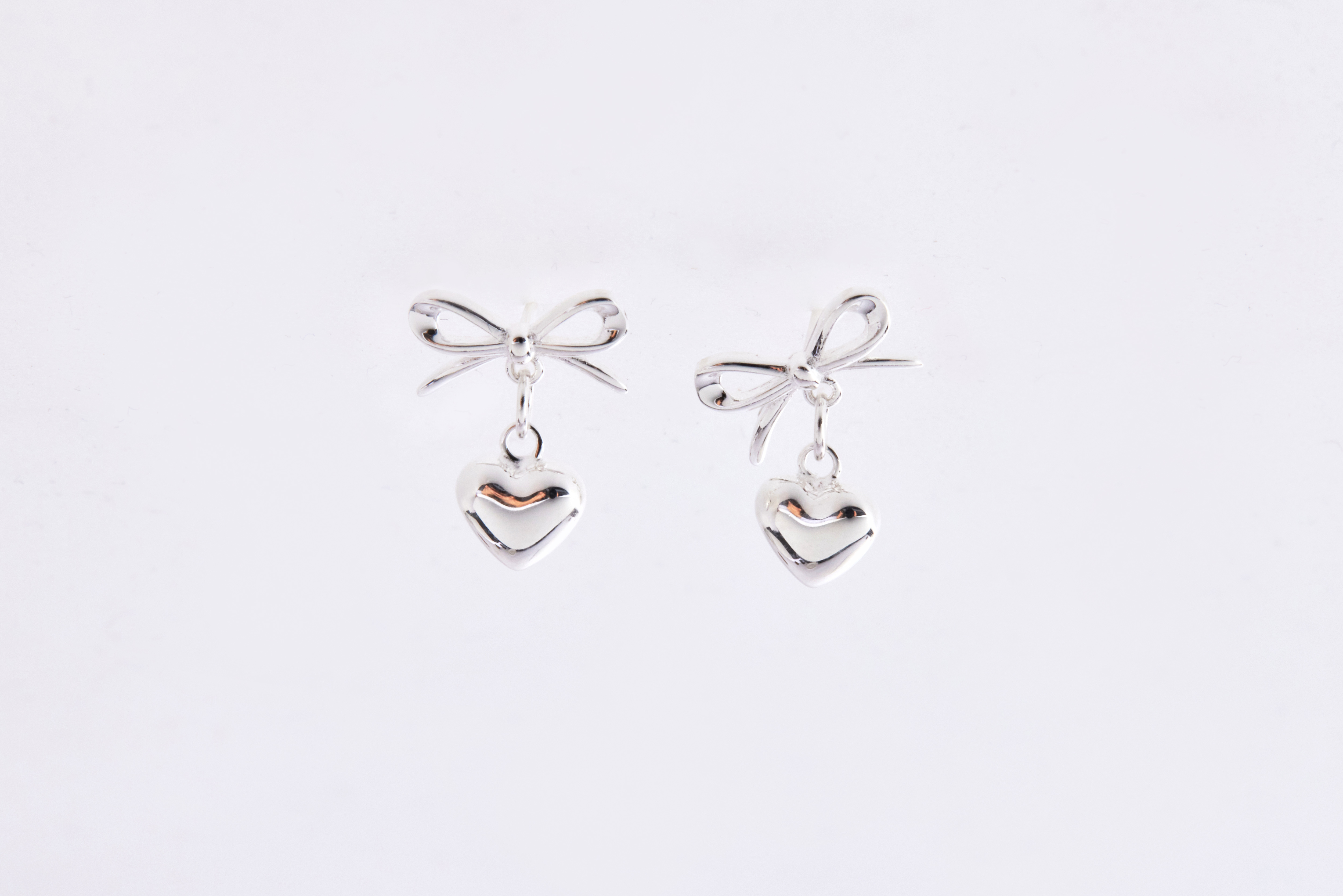 E2552 | 純銀蝴蝶結愛心耳環