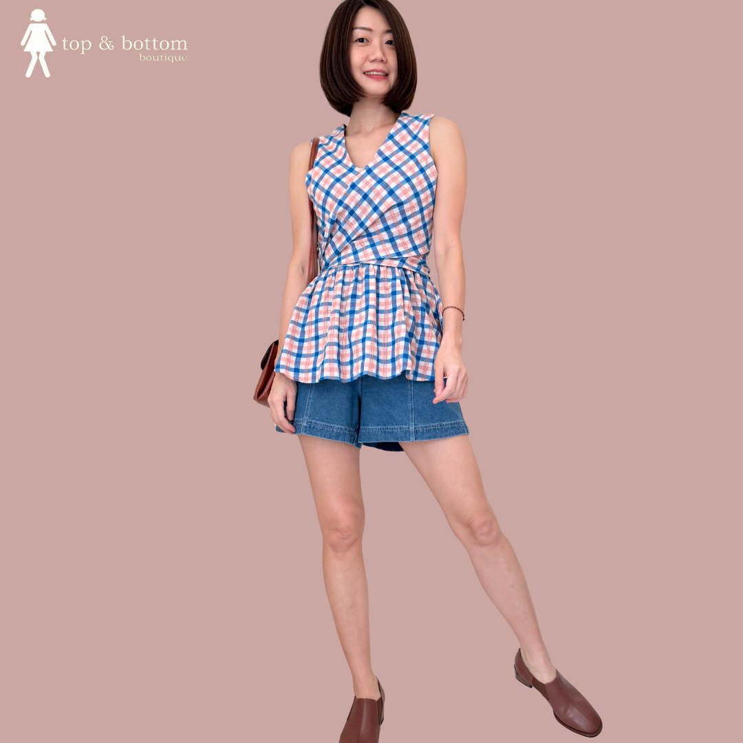 SLEEVELESS CHECKED WRAP AROUND BLOUSE