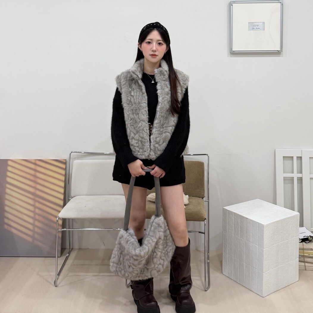 奶huhu 搭包包立領水貂毛背心
