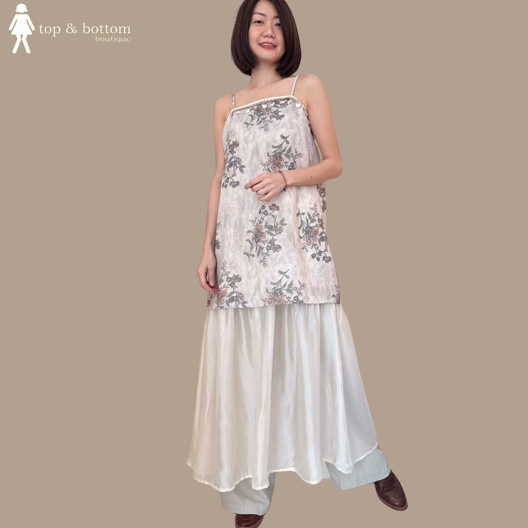 STRAP PRINTED FLORAL DRESS WITH SHEER HEM