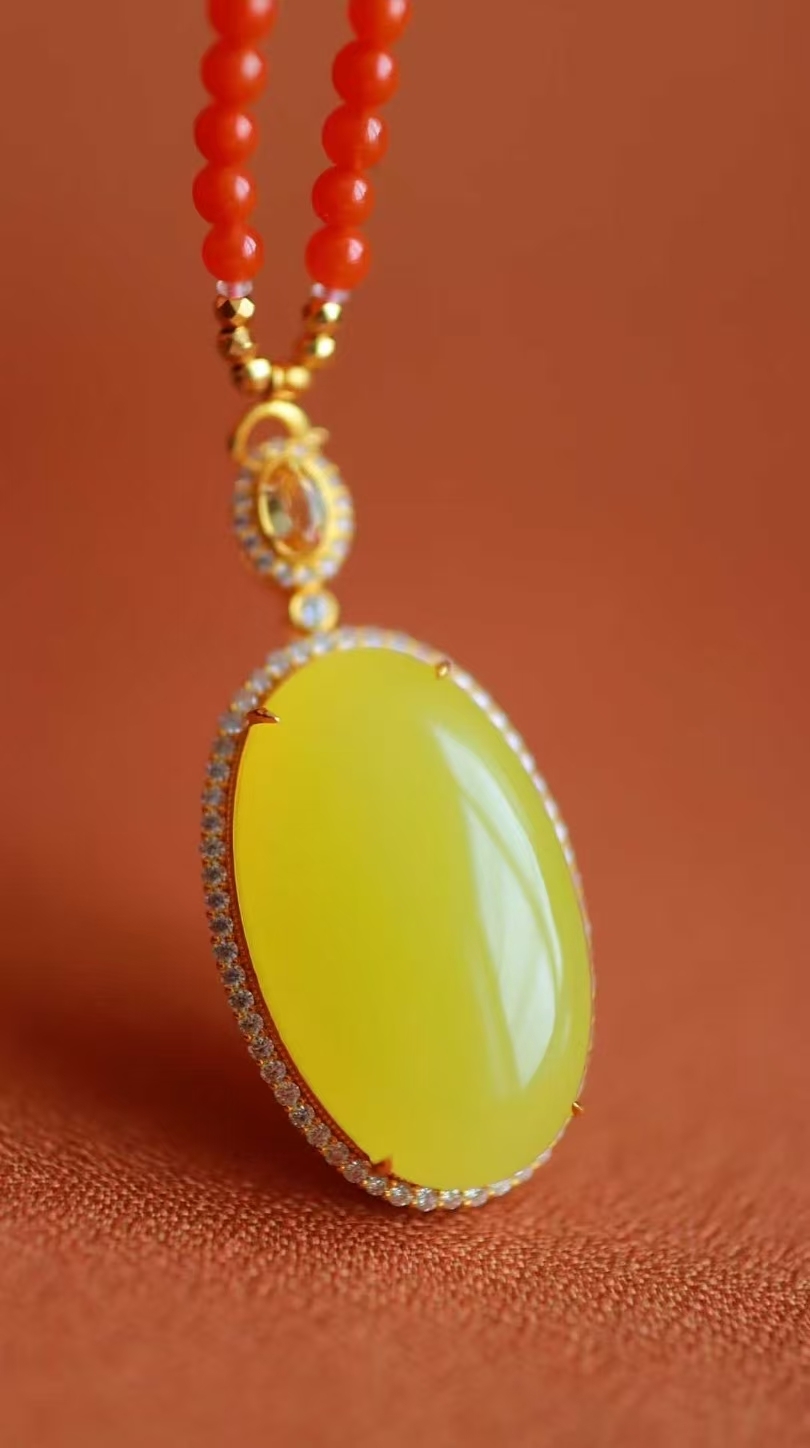 和田玉若羌雞油黃吊墜,天然和田玉軟玉